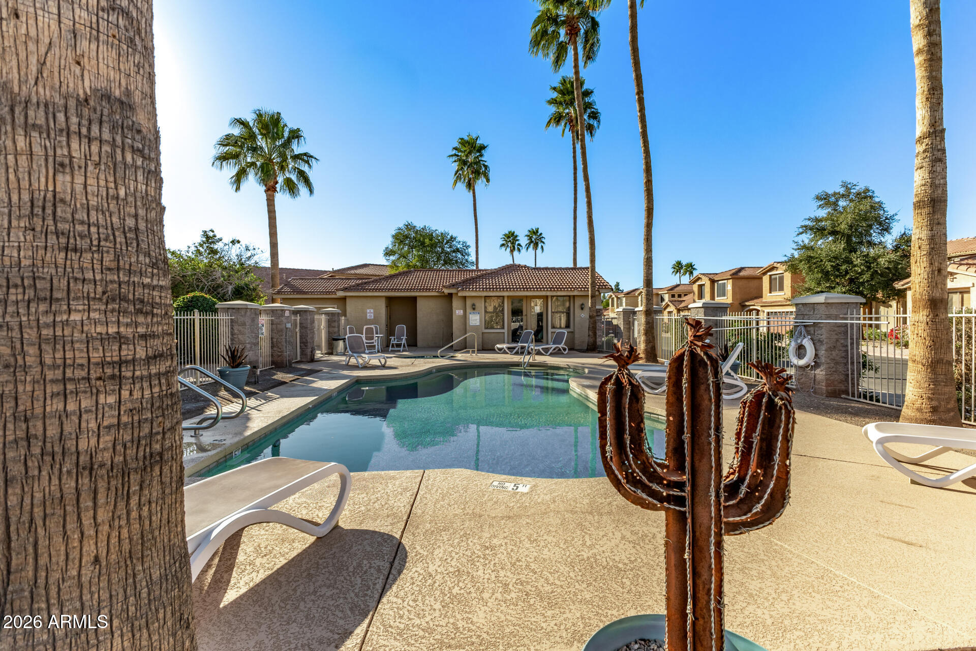 5415 East McKellips Road, Unit 106 Mesa, AZ 85215 - Photo 42 of 45 a view of a house with backyard and swimming pool