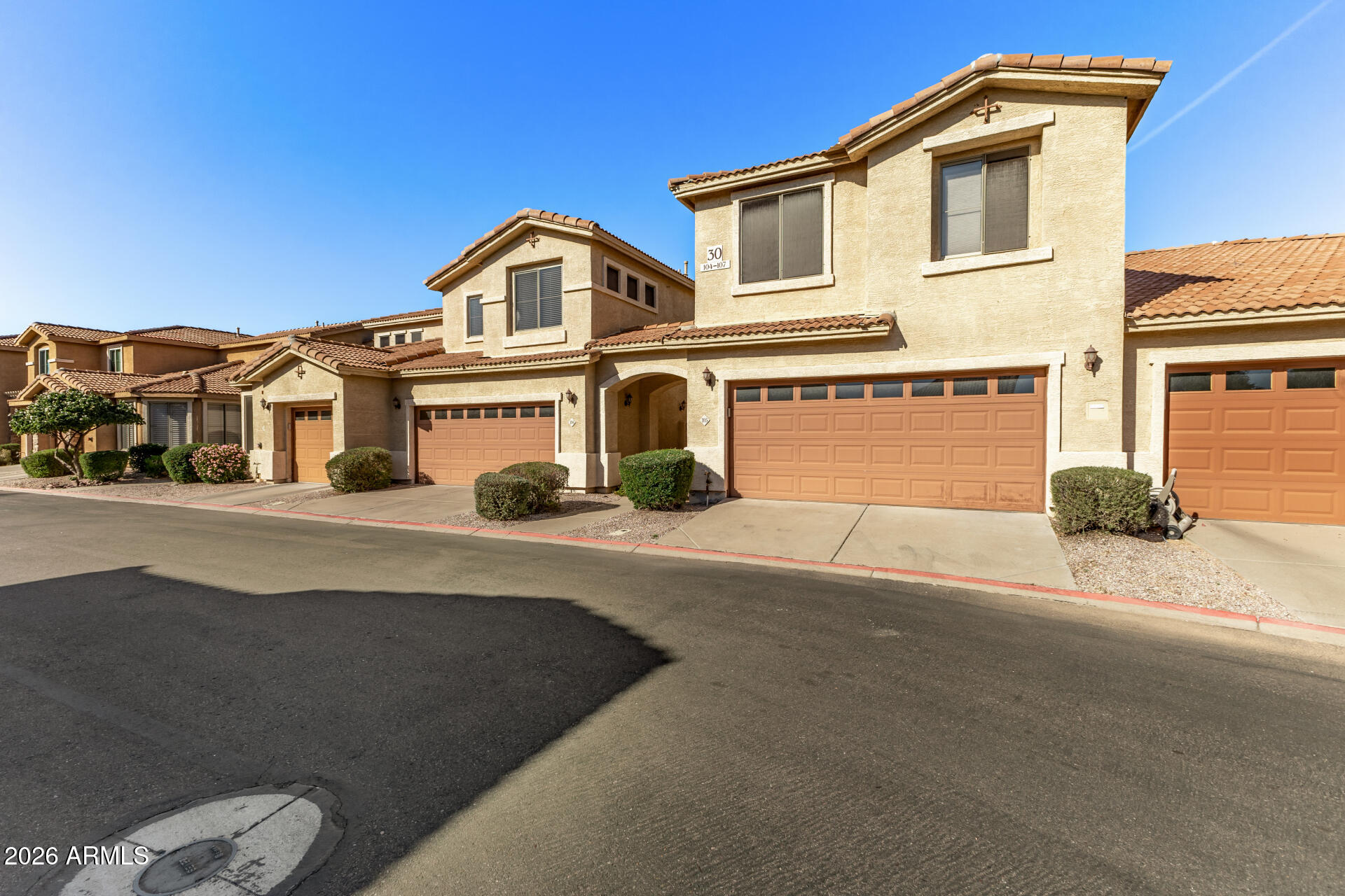 5415 East McKellips Road, Unit 106 Mesa, AZ 85215 - Photo 6 of 45 a front view of a house with a yard