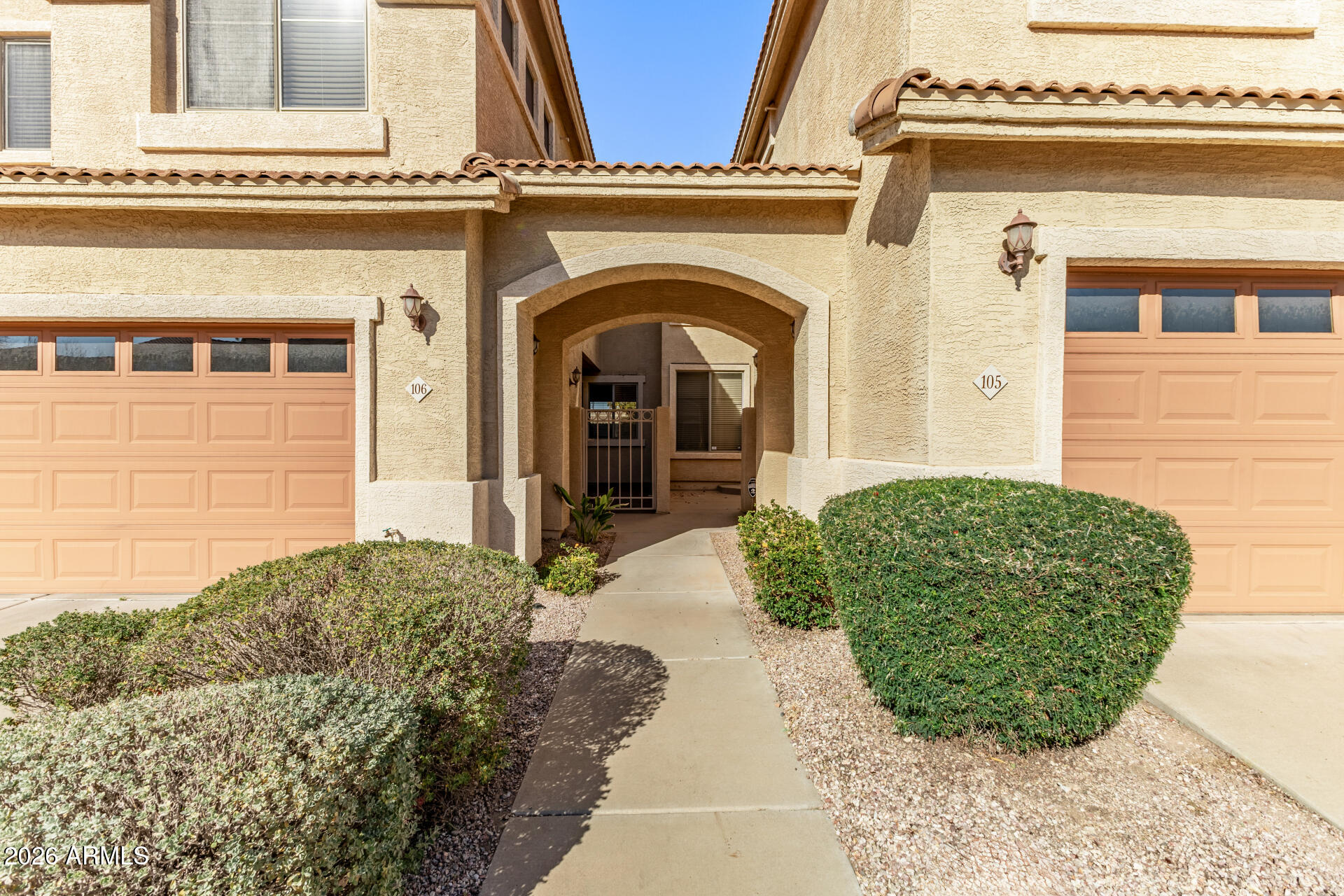 5415 East McKellips Road, Unit 106 Mesa, AZ 85215 - Photo 7 of 45 a view of a house with potted plants