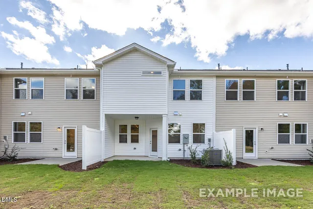 a kitchen with a dining table and chairs