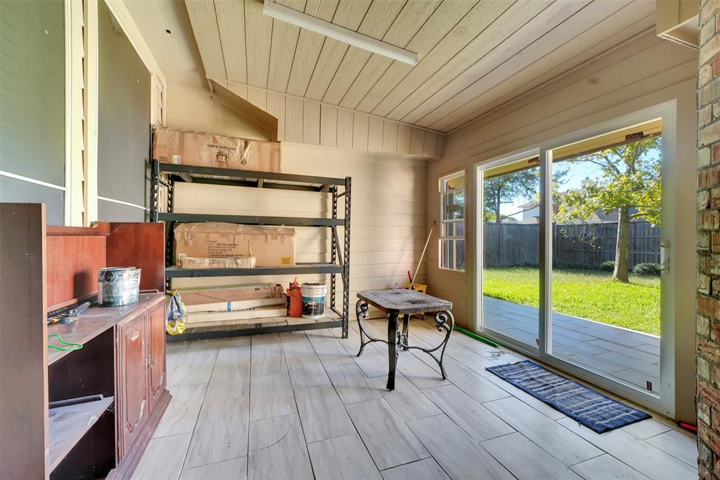 5409 Deer Brook Road Garland, TX 75044 - Photo 29 of 31 a bedroom with furniture and a window