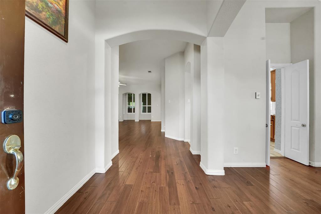 5409 Deer Brook Road Garland, TX 75044 - Photo 4 of 31 wooden floor in a gallery