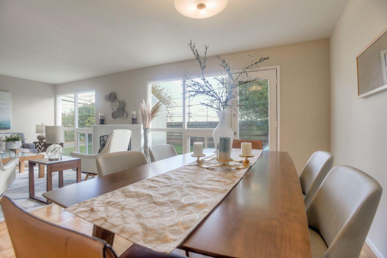 805 Robin Lane Millbrae, CA 94030 - Photo 12 of 23 a view of a dining room with furniture wooden floor and chandelier