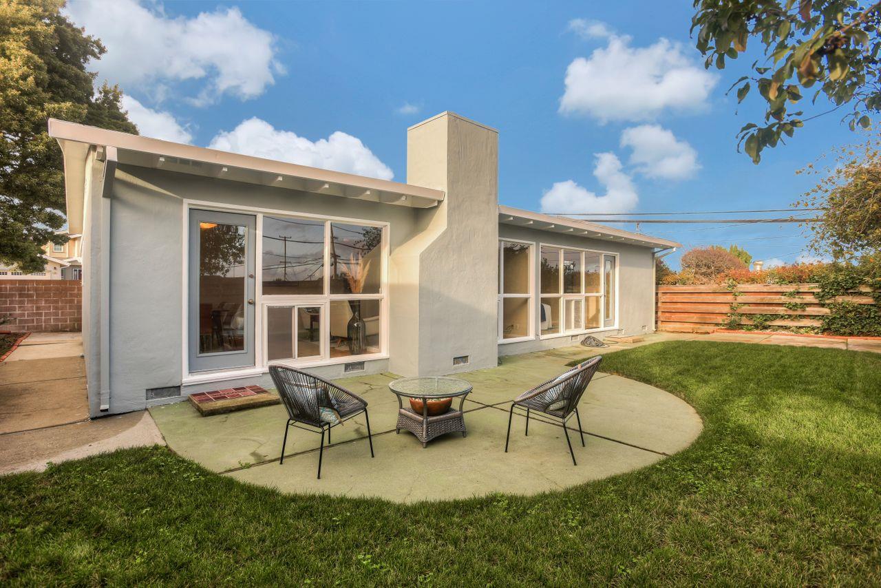 805 Robin Lane Millbrae, CA 94030 - Photo 22 of 23 a view of a house with backyard porch and sitting area
