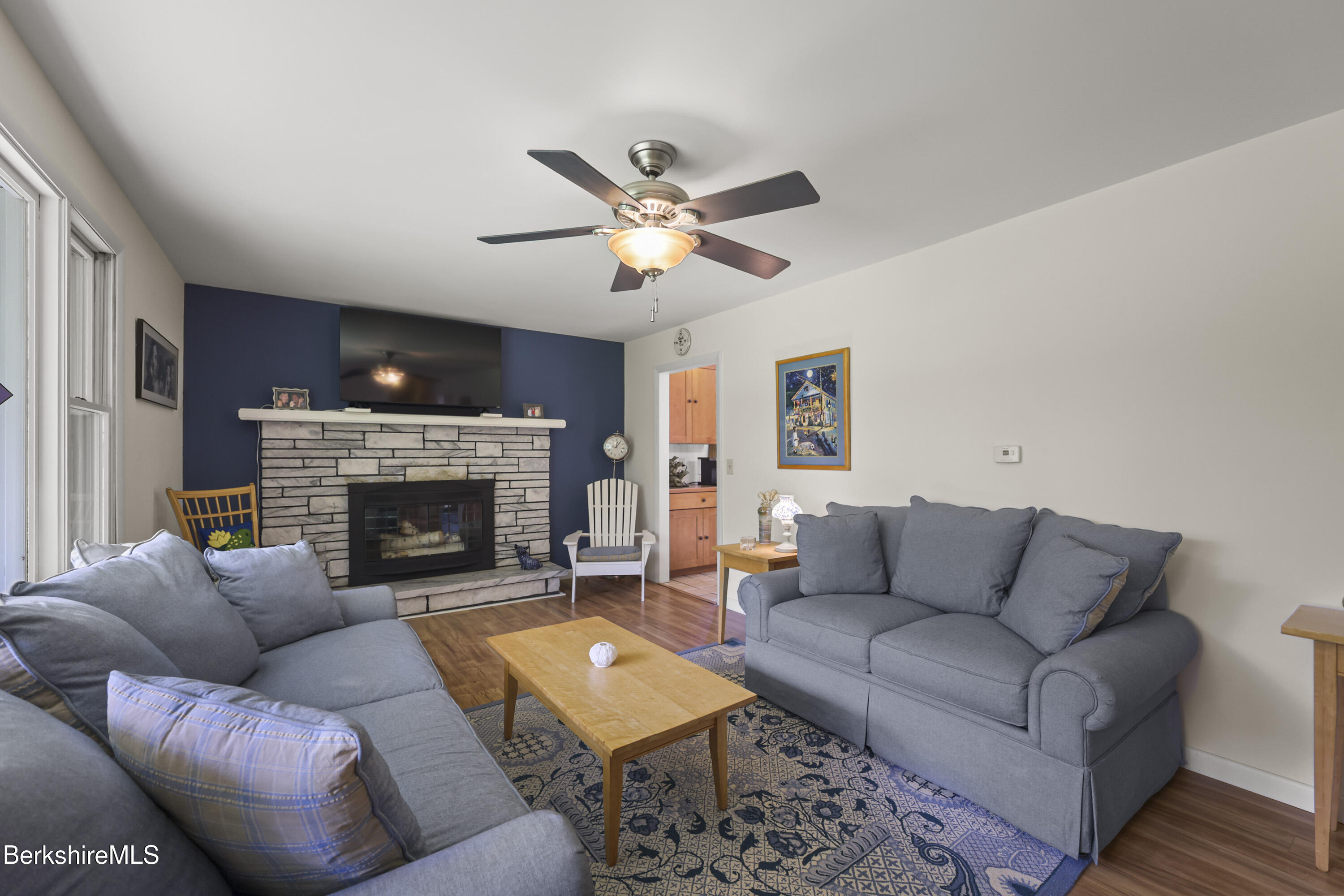 4 Birch Hill Road Peru, MA 01235 - Photo 12 of 76 a living room with furniture and a fireplace