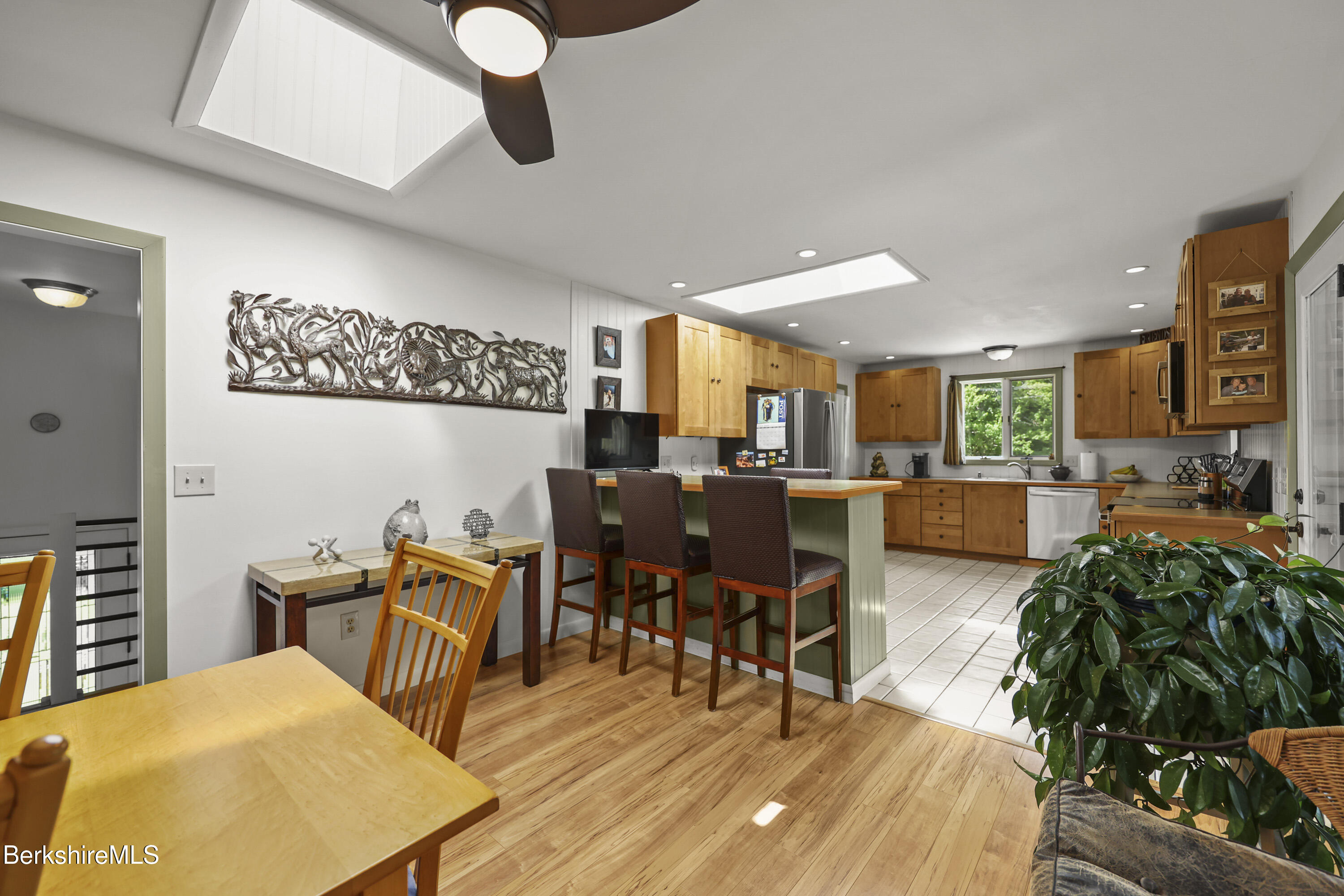 4 Birch Hill Road Peru, MA 01235 - Photo 17 of 76 a living room with furniture kitchen view and a potted plant