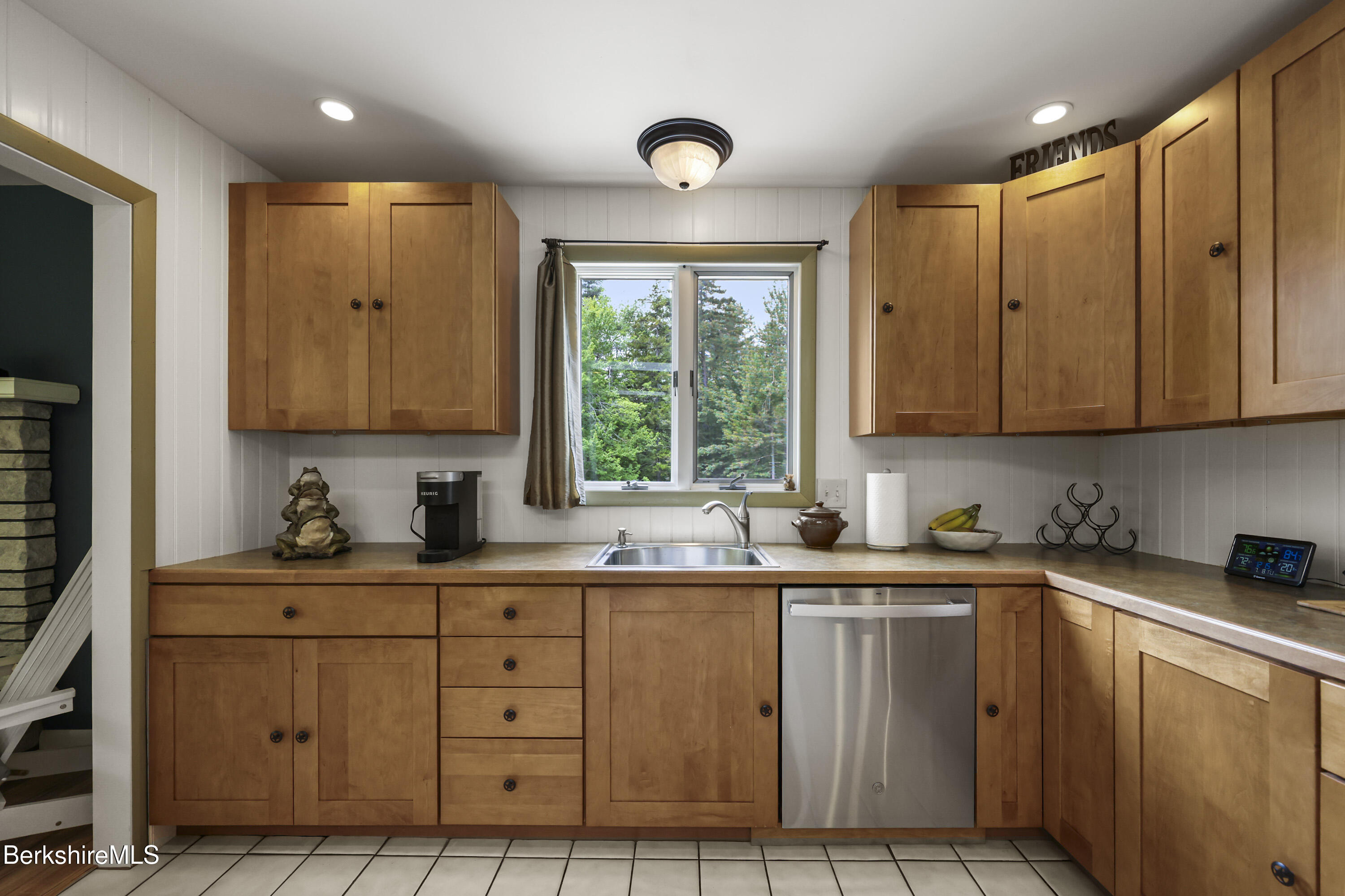 4 Birch Hill Road Peru, MA 01235 - Photo 24 of 76 a kitchen with stainless steel appliances granite countertop a sink window and cabinets