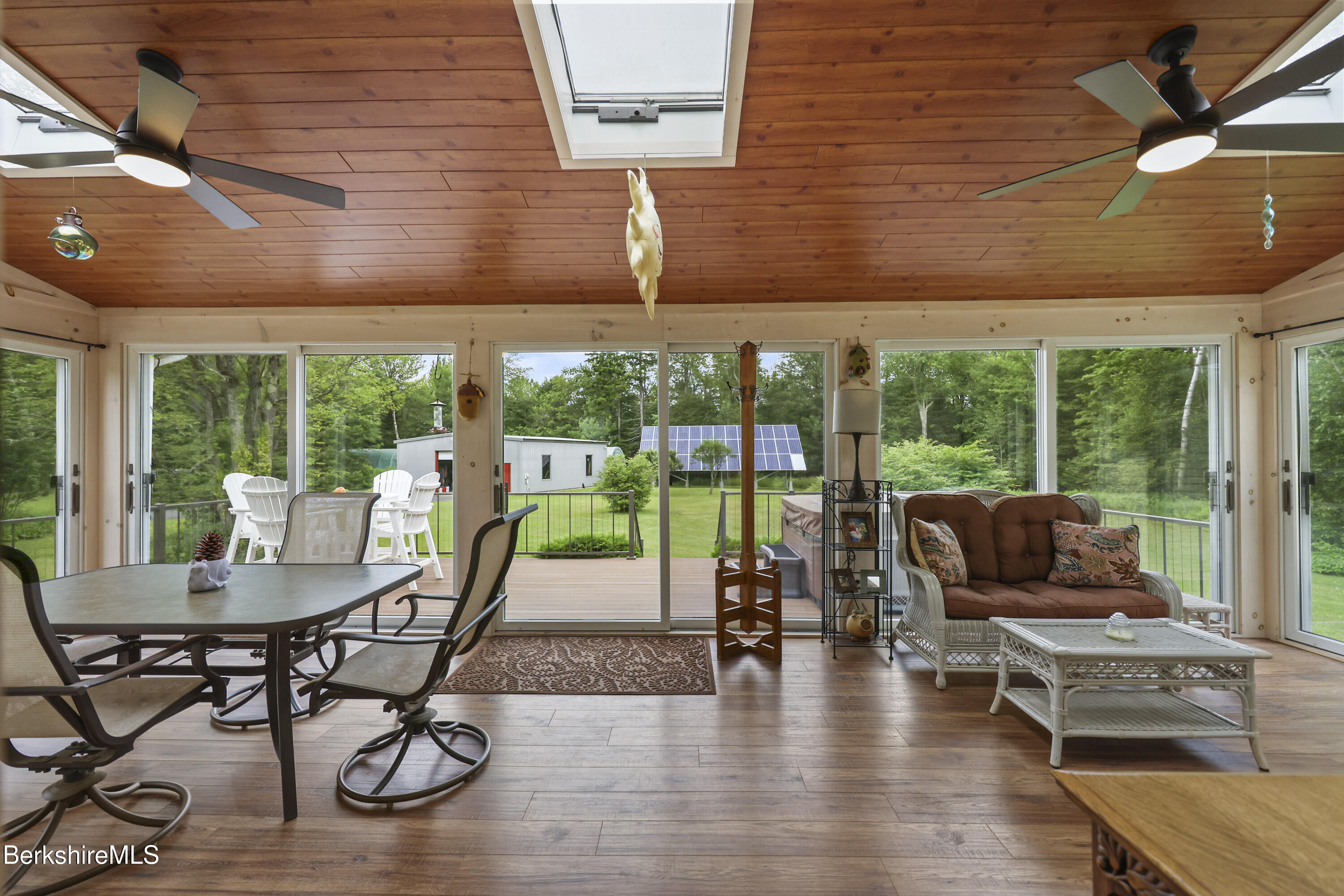 4 Birch Hill Road Peru, MA 01235 - Photo 26 of 76 a dining room with furniture water view and wooden floor