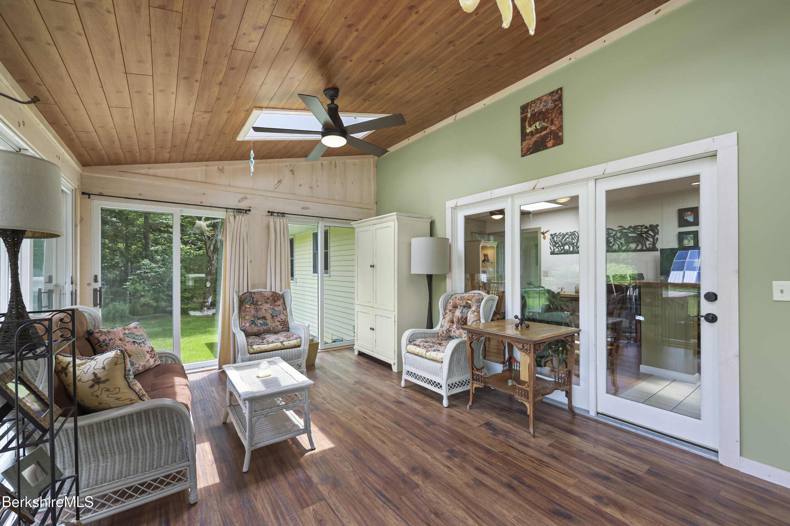 4 Birch Hill Road Peru, MA 01235 - Photo 29 of 76 a living room with furniture and a floor to ceiling window