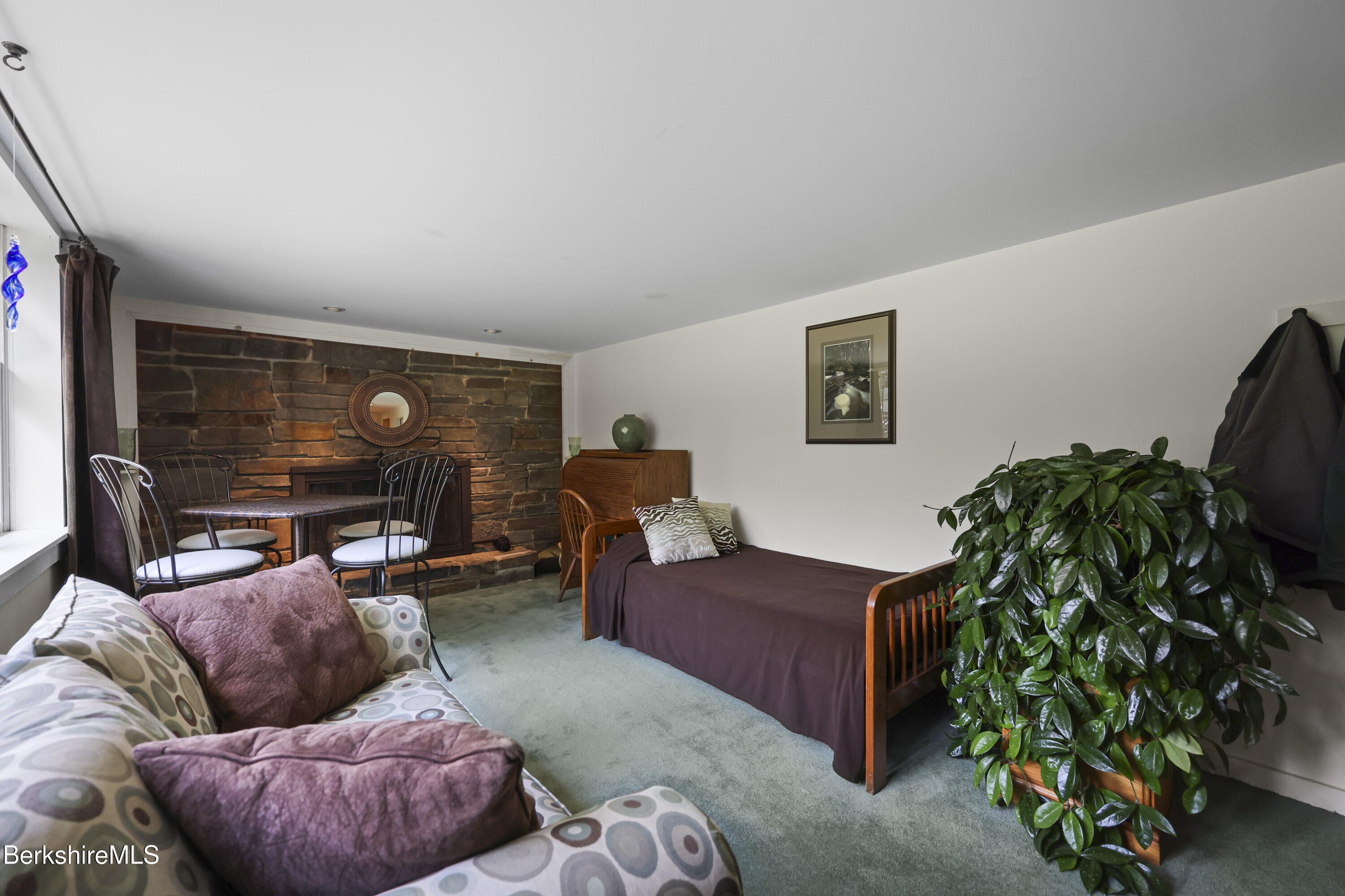 4 Birch Hill Road Peru, MA 01235 - Photo 40 of 76 a living room with furniture and a flat screen tv