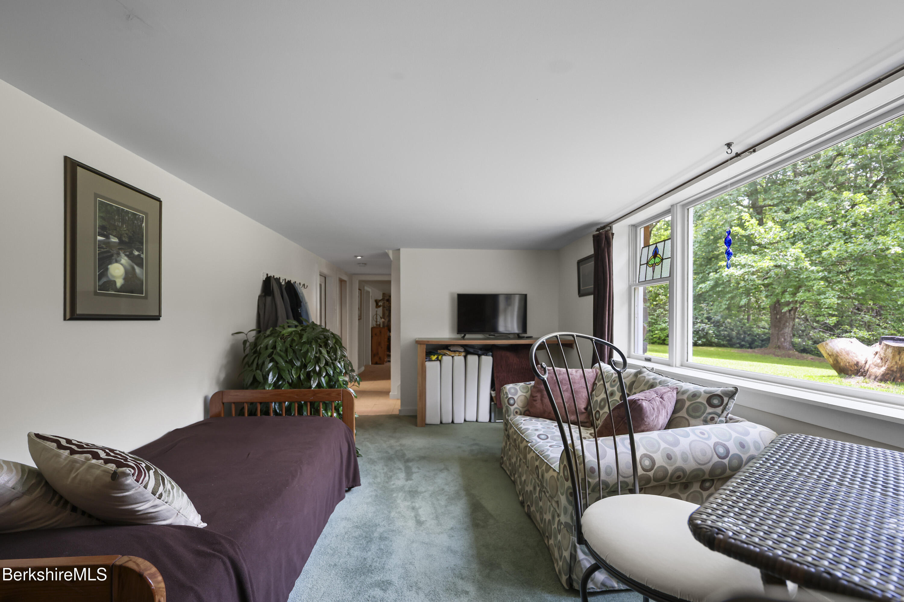4 Birch Hill Road Peru, MA 01235 - Photo 43 of 76 a living room with furniture and a large window