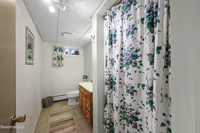 a view of a house with a big yard