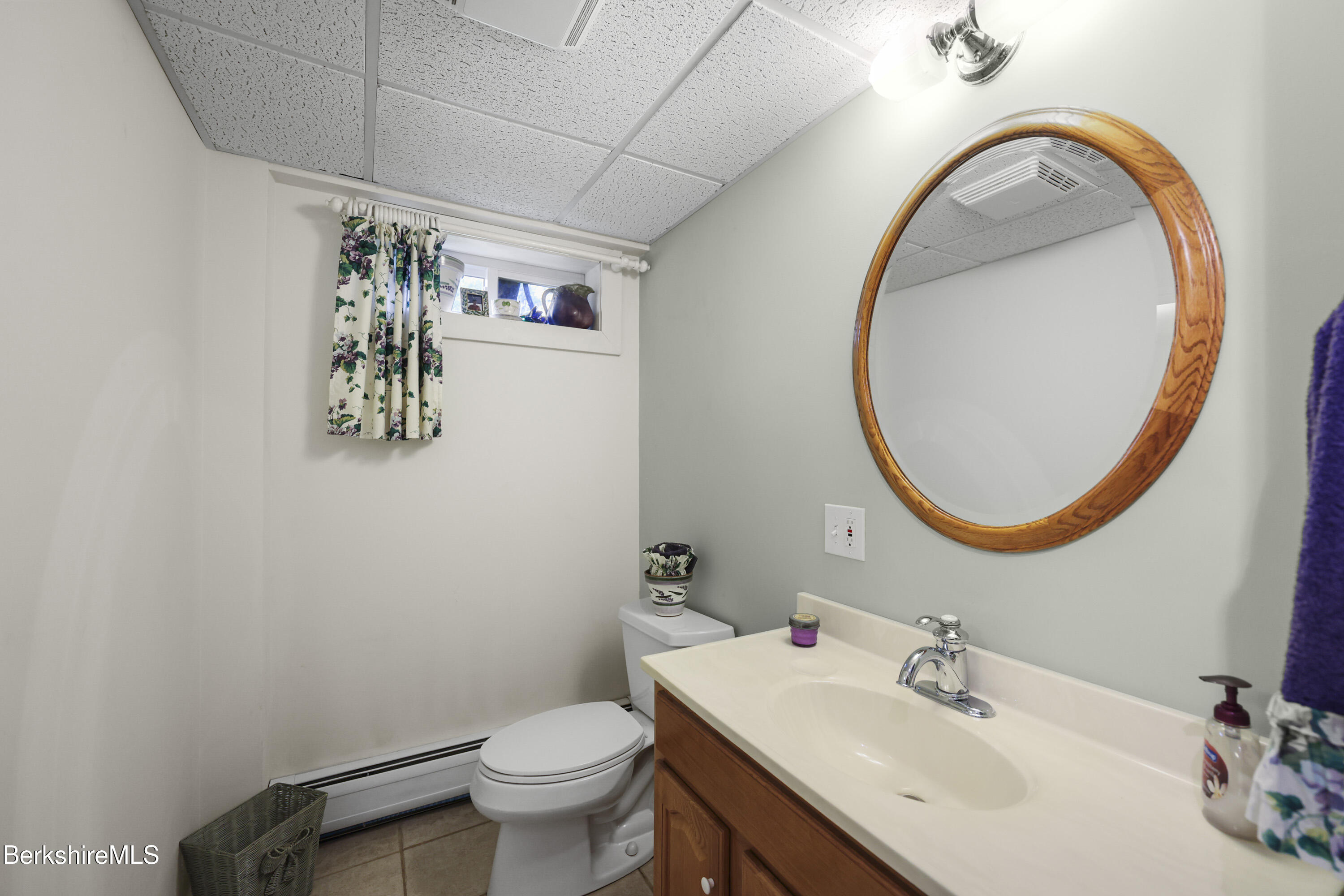 4 Birch Hill Road Peru, MA 01235 - Photo 47 of 76 a bathroom with a sink mirror and toilet