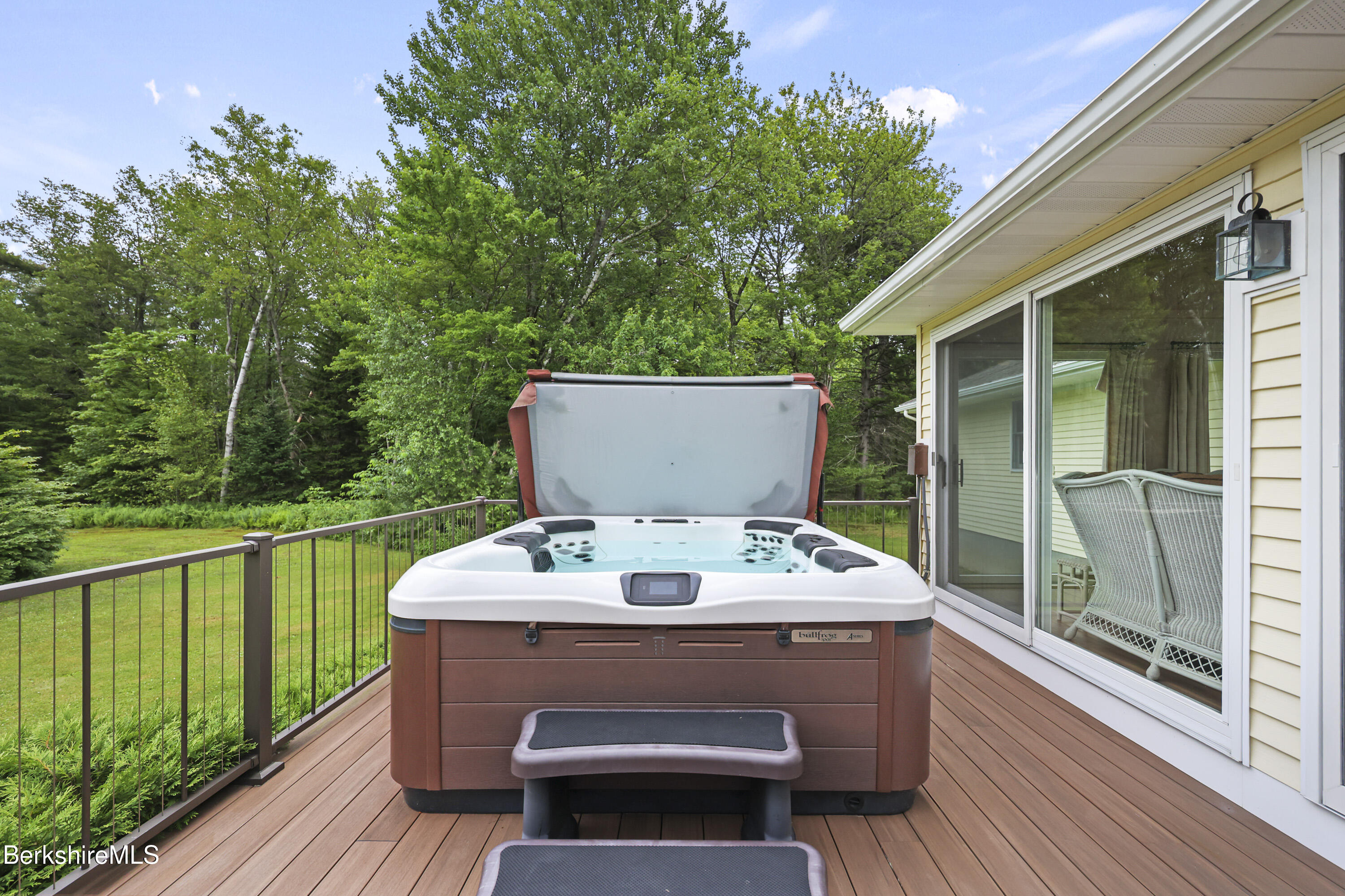 4 Birch Hill Road Peru, MA 01235 - Photo 52 of 76 a view of house with deck outdoor seating and hardwood