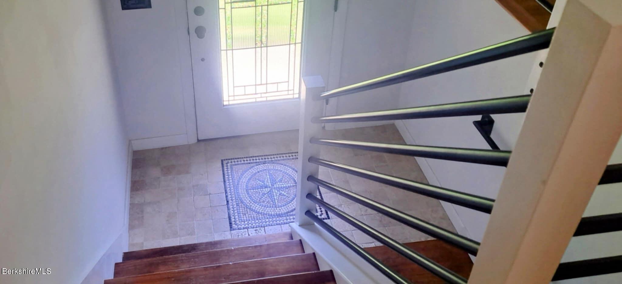 4 Birch Hill Road Peru, MA 01235 - Photo 7 of 76 a view of an empty room with wooden floor and a window