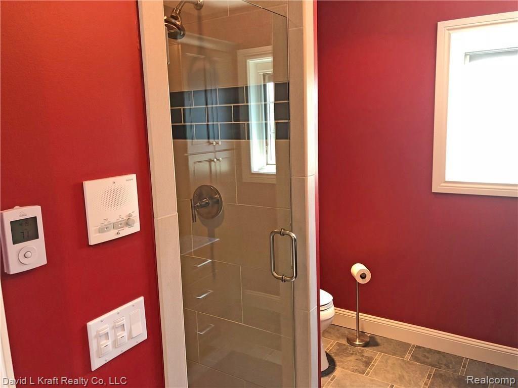 9204 Crescent Beach Road Pigeon, MI 48755 - Photo 32 of 66 9204CrescentBeachBed1EnsuiteShower.jpg