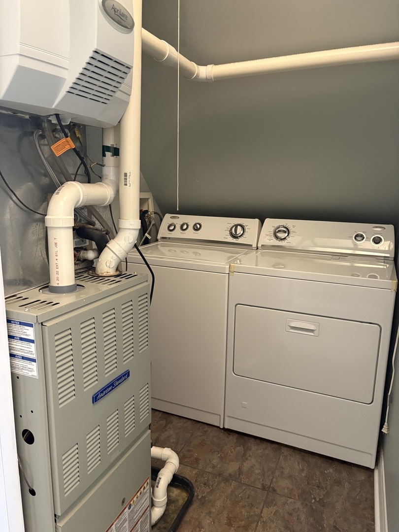 3528 North Neva Avenue Chicago, IL 60634 - Photo 20 of 37 a utility room with dryer and washer