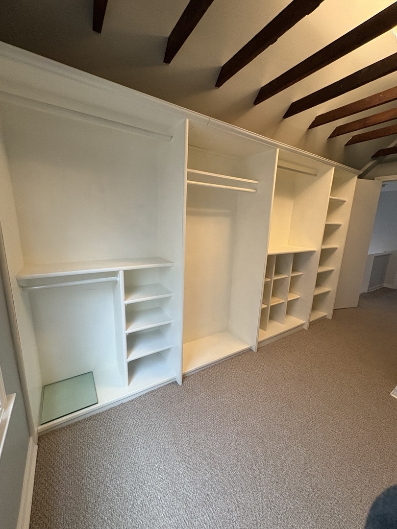 3528 North Neva Avenue Chicago, IL 60634 - Photo 22 of 37 a view of an empty walk in closet