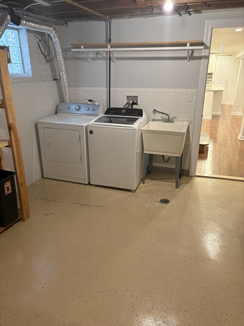 3528 North Neva Avenue Chicago, IL 60634 - Photo 32 of 37 a utility room with dryer and washer