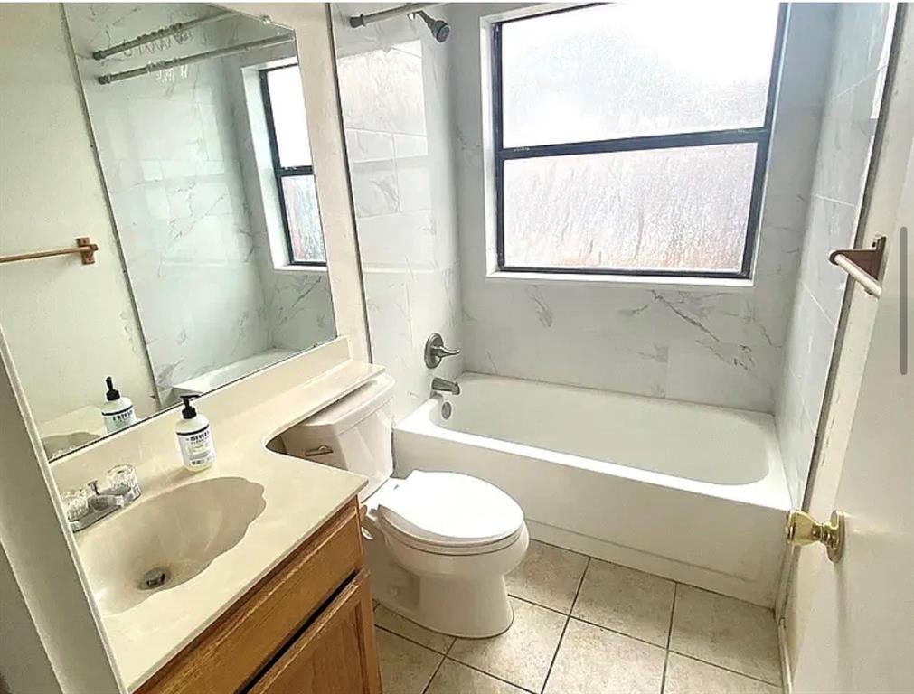 2614 Timberview Circle Corinth, TX 76210 - Photo 15 of 18 a bathroom with a sink a toilet and a bathtub