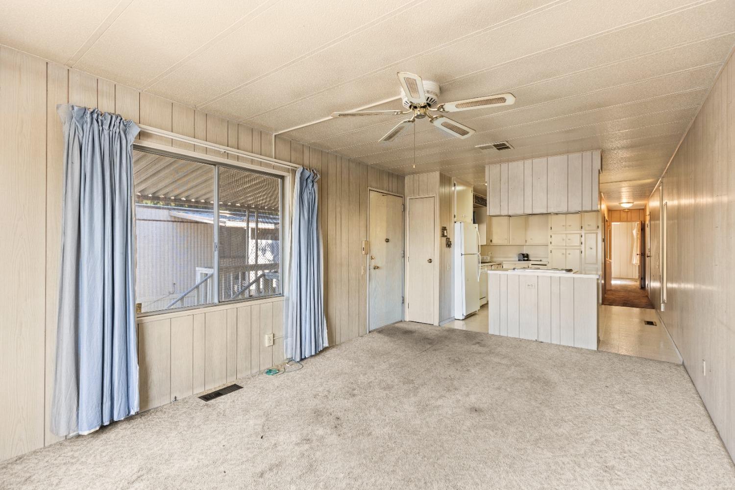 417 Westacre Road, Unit 22 West Sacramento, CA 95691 - Photo 4 of 4 a view of a kitchen with a sink and cabinet area