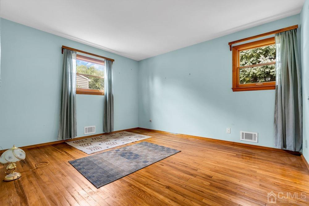 13 Eardley Road Edison, NJ 08817 - Photo 13 of 35 a view of an empty room and window