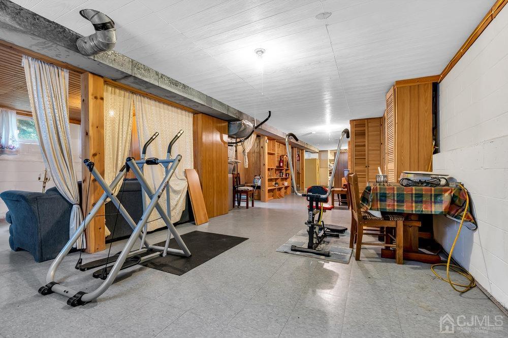 13 Eardley Road Edison, NJ 08817 - Photo 22 of 35 a view of a room with gym equipment