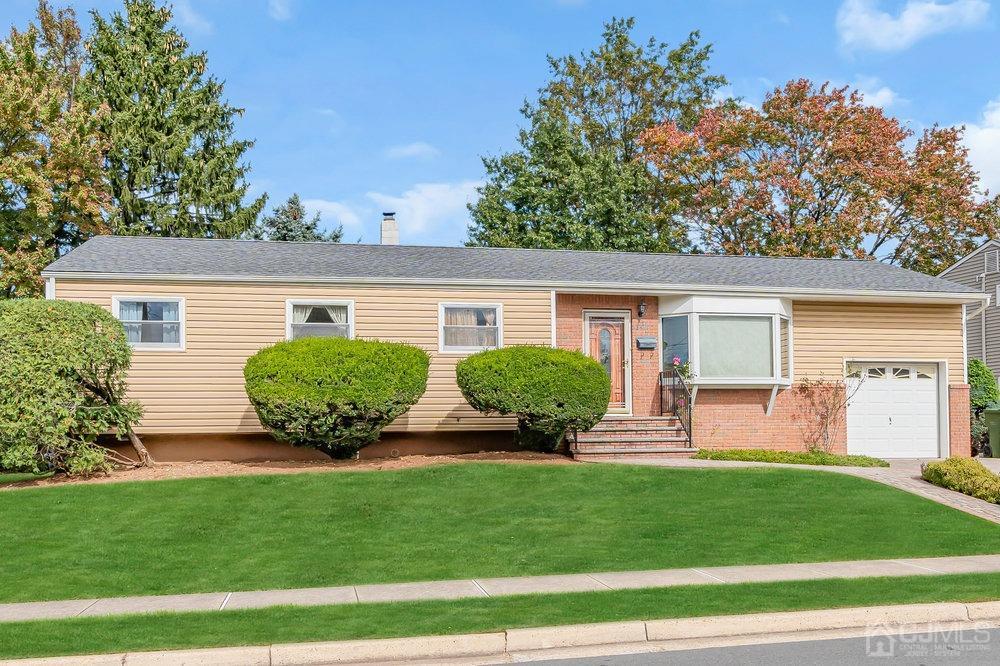 13 Eardley Road Edison, NJ 08817 - Photo 28 of 35 a front view of house with yard and green space