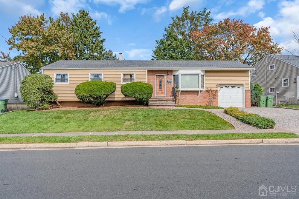 13 Eardley Road Edison, NJ 08817 - Photo 29 of 35 front view of house with a yard