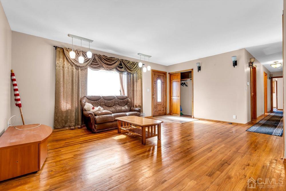 13 Eardley Road Edison, NJ 08817 - Photo 3 of 35 a living room with furniture window and wooden floor
