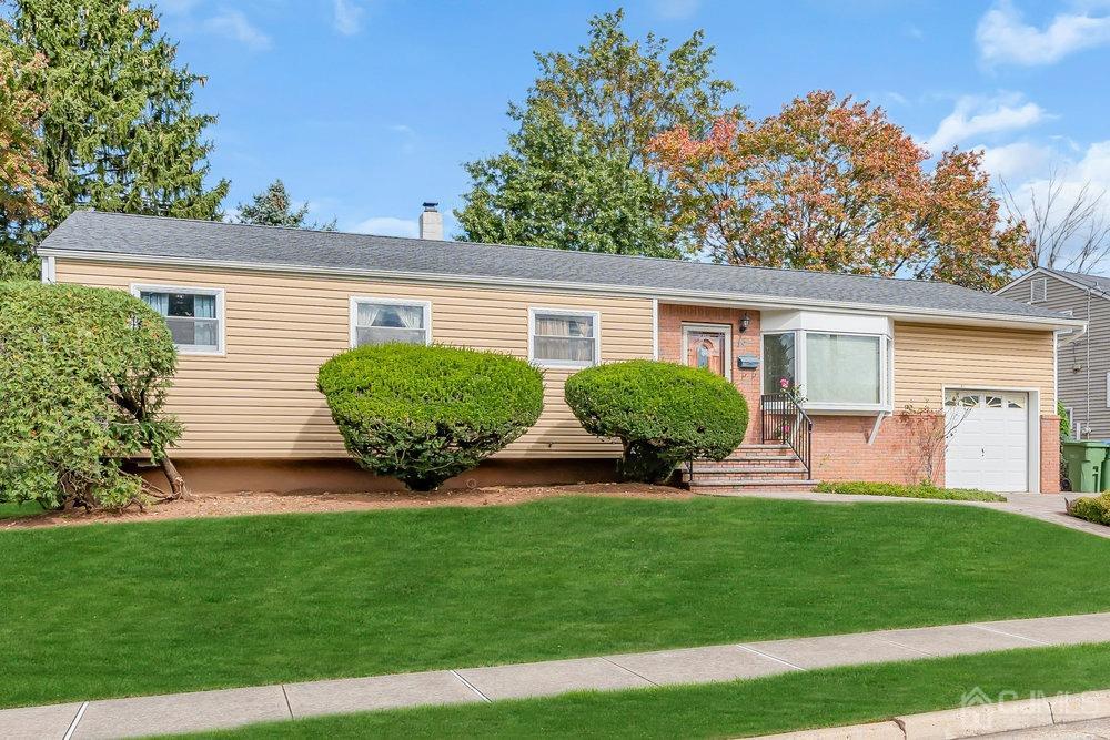 13 Eardley Road Edison, NJ 08817 - Photo 33 of 35 a view of a house with backyard and porch