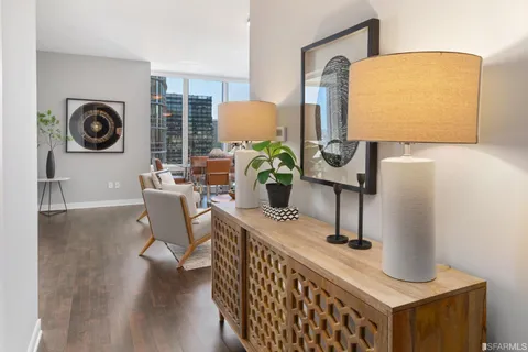 a living room with furniture and a window