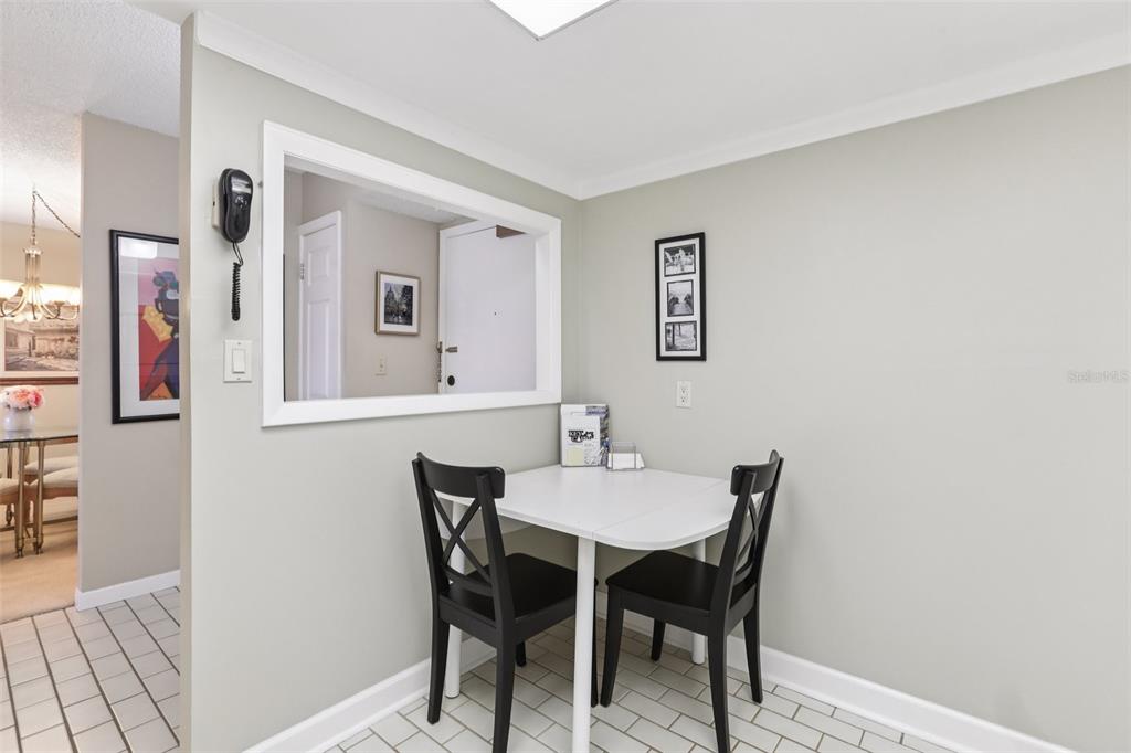 1 Key Capri, Unit 302E Treasure Island, FL 33706 - Photo 12 of 29 a view of a dining room with furniture