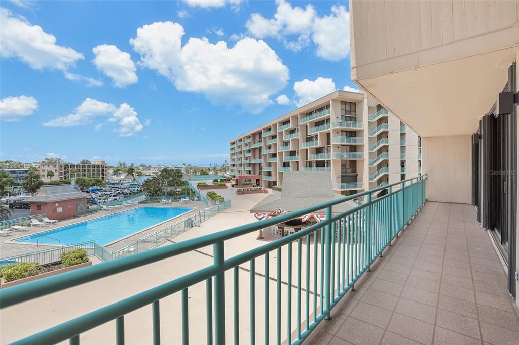 1 Key Capri, Unit 302E Treasure Island, FL 33706 - Photo 22 of 29 a view of building from balcony