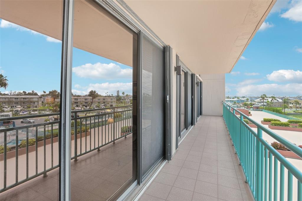 1 Key Capri, Unit 302E Treasure Island, FL 33706 - Photo 23 of 29 a view of a city from a balcony