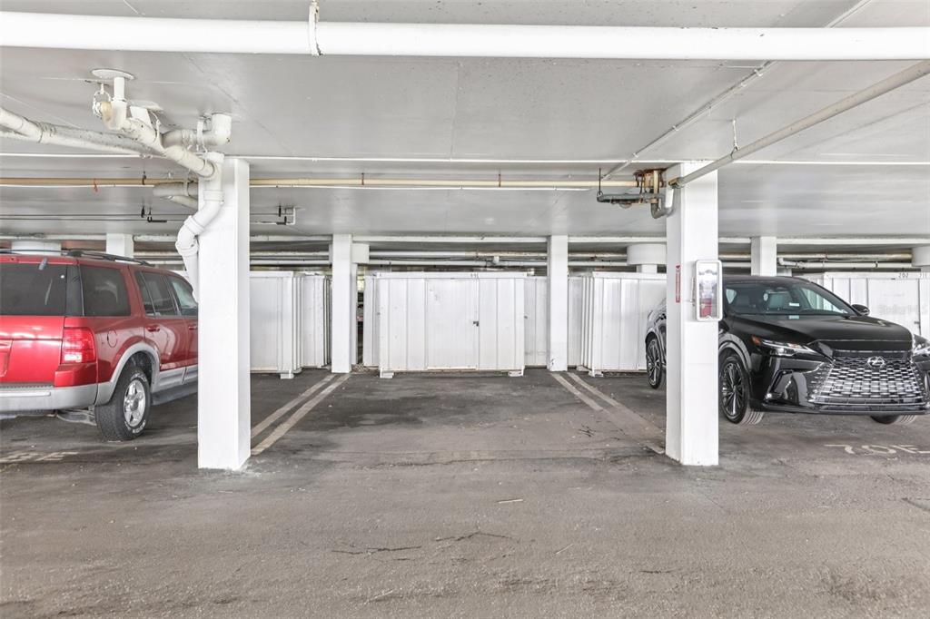 1 Key Capri, Unit 302E Treasure Island, FL 33706 - Photo 26 of 29 a view of parking garage with cars