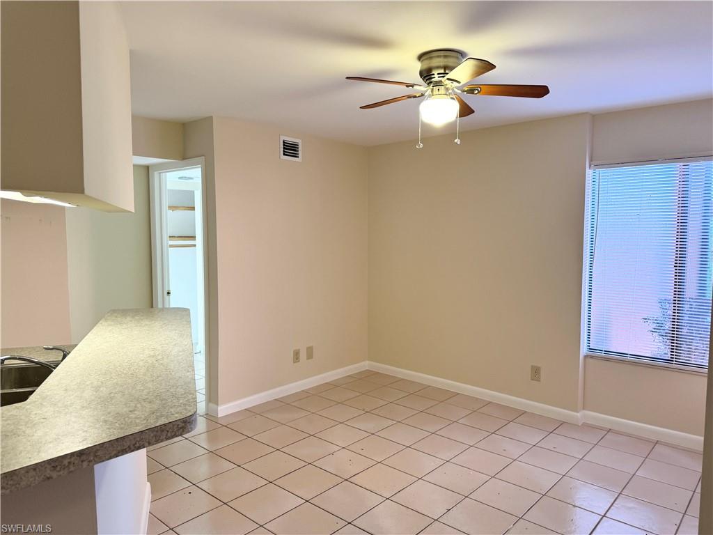 124 Cypress Way East, Unit E3 Naples, FL 34110 - Photo 13 of 22 a view of an empty room
