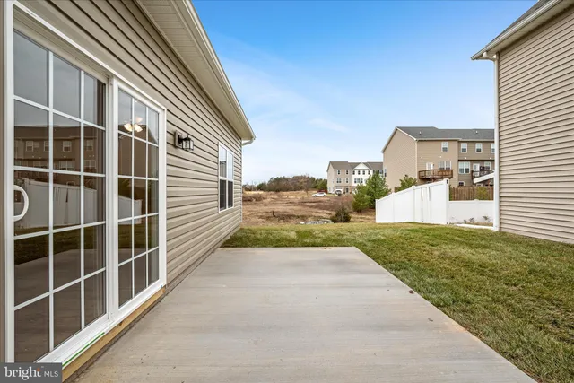 a view of a back yard of a house