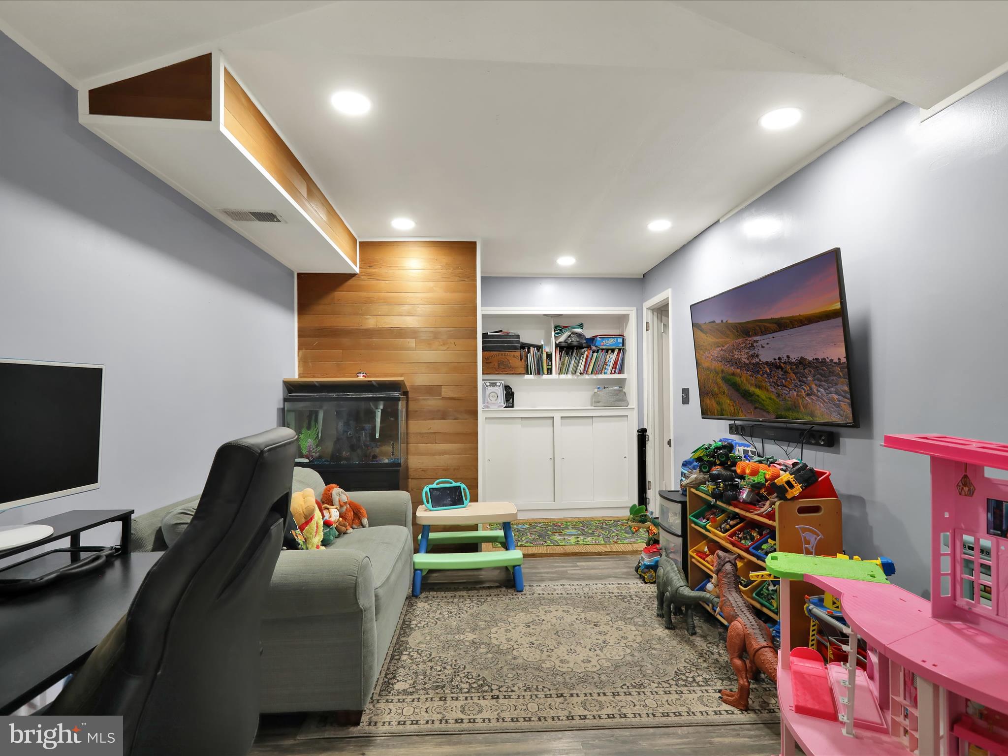 1212 Deer Run Reading, PA 19606 - Photo 12 of 29 a living room with furniture and a flat screen tv