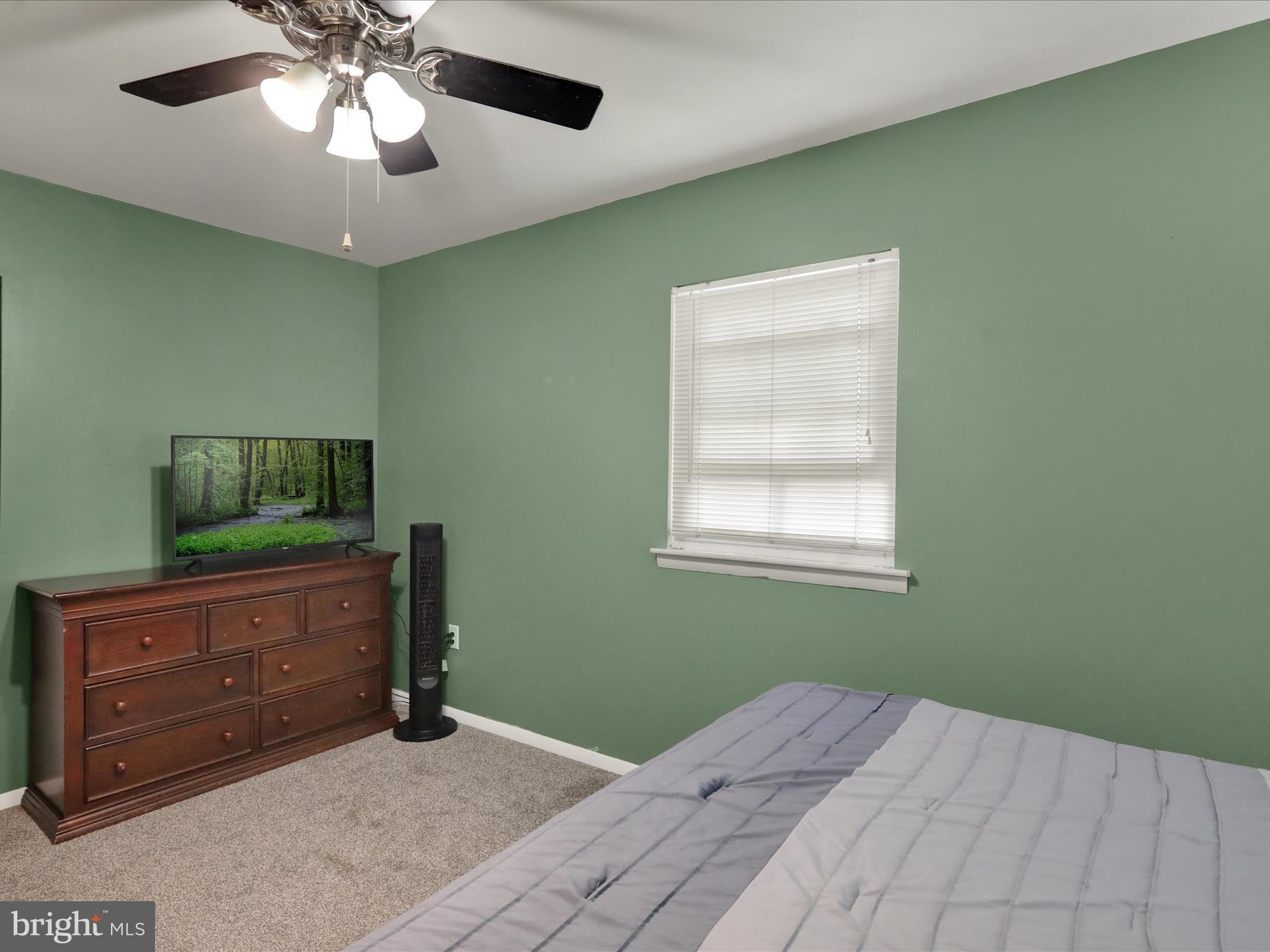 1212 Deer Run Reading, PA 19606 - Photo 14 of 29 a bedroom with a bed and a dresser
