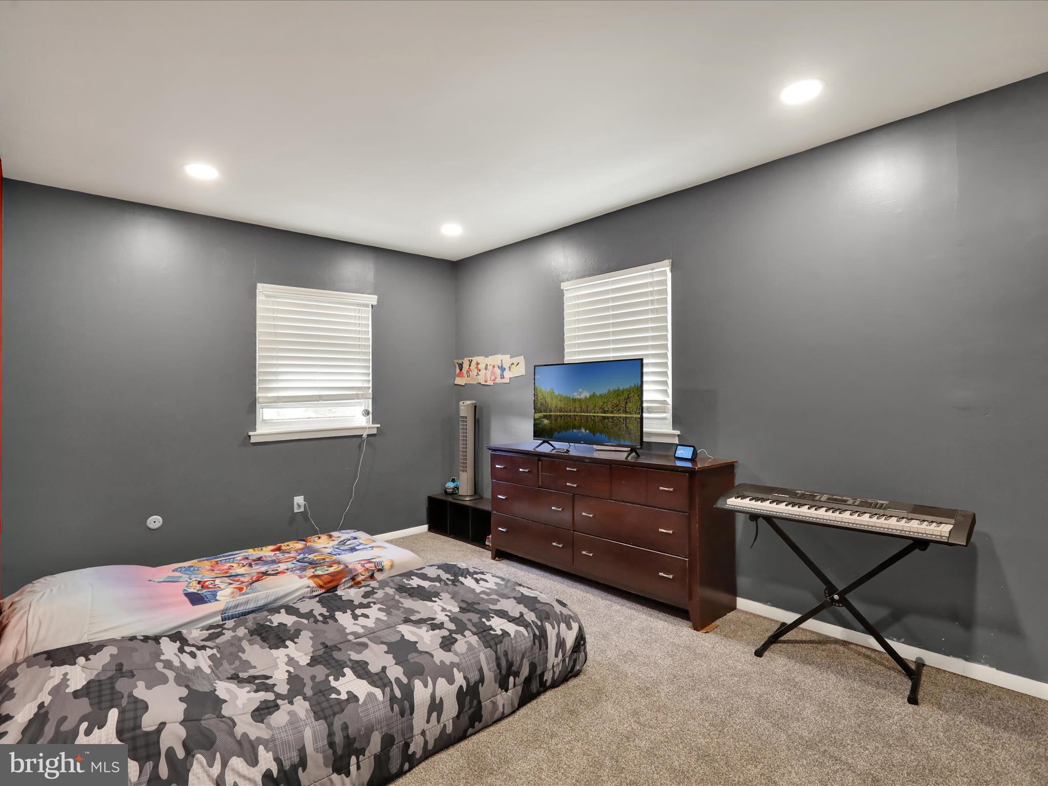 1212 Deer Run Reading, PA 19606 - Photo 15 of 29 a bedroom with a bed window and a desk
