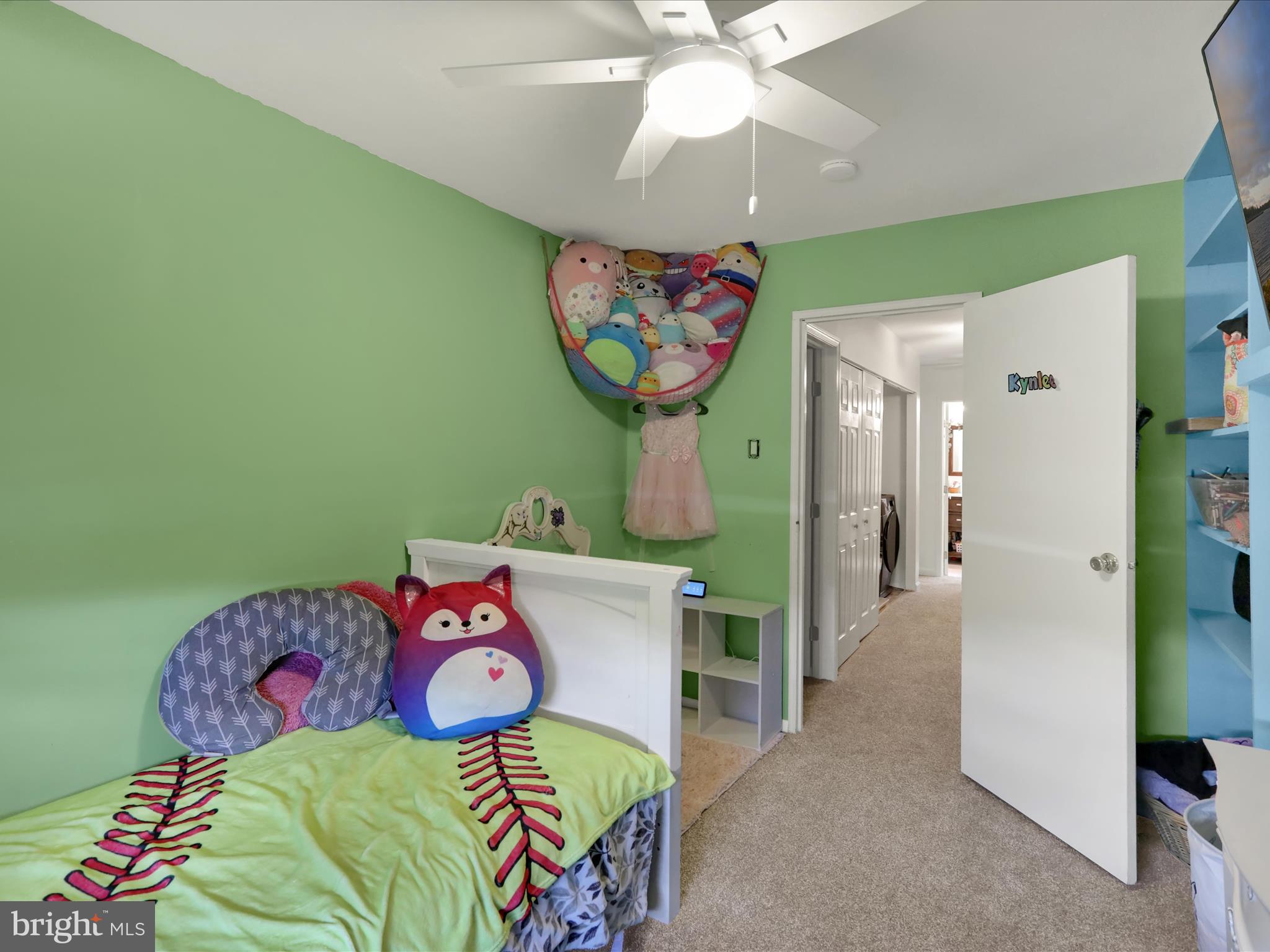 1212 Deer Run Reading, PA 19606 - Photo 18 of 29 a bedroom with a bed and a chandelier