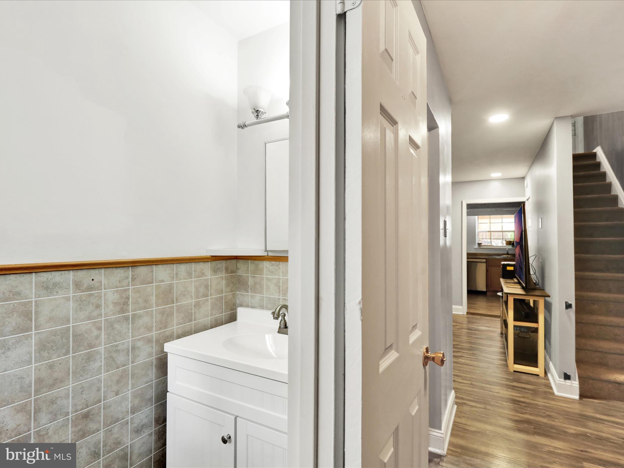 1212 Deer Run Reading, PA 19606 - Photo 20 of 29 a bathroom with a sink and a mirror