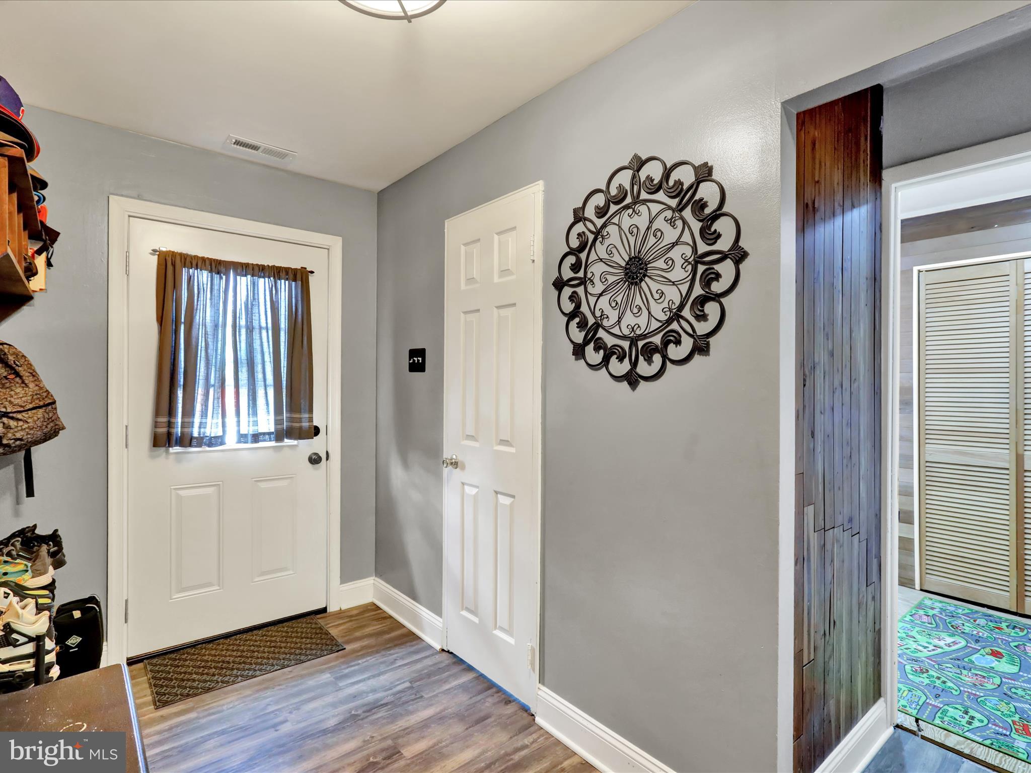 1212 Deer Run Reading, PA 19606 - Photo 2 of 29 a view of entryway with wooden floor
