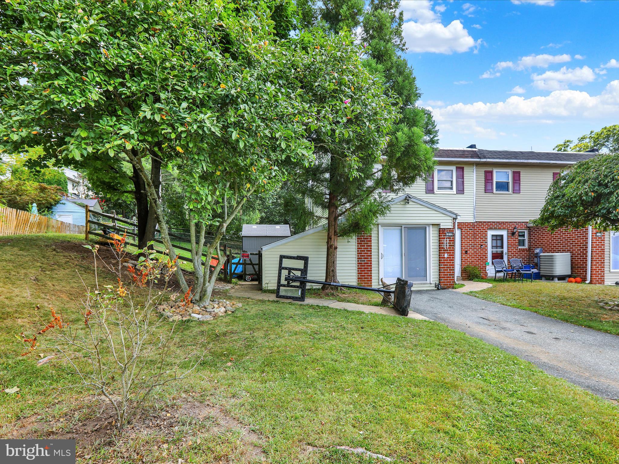 1212 Deer Run Reading, PA 19606 - Photo 28 of 29 a front view of a house with a yard