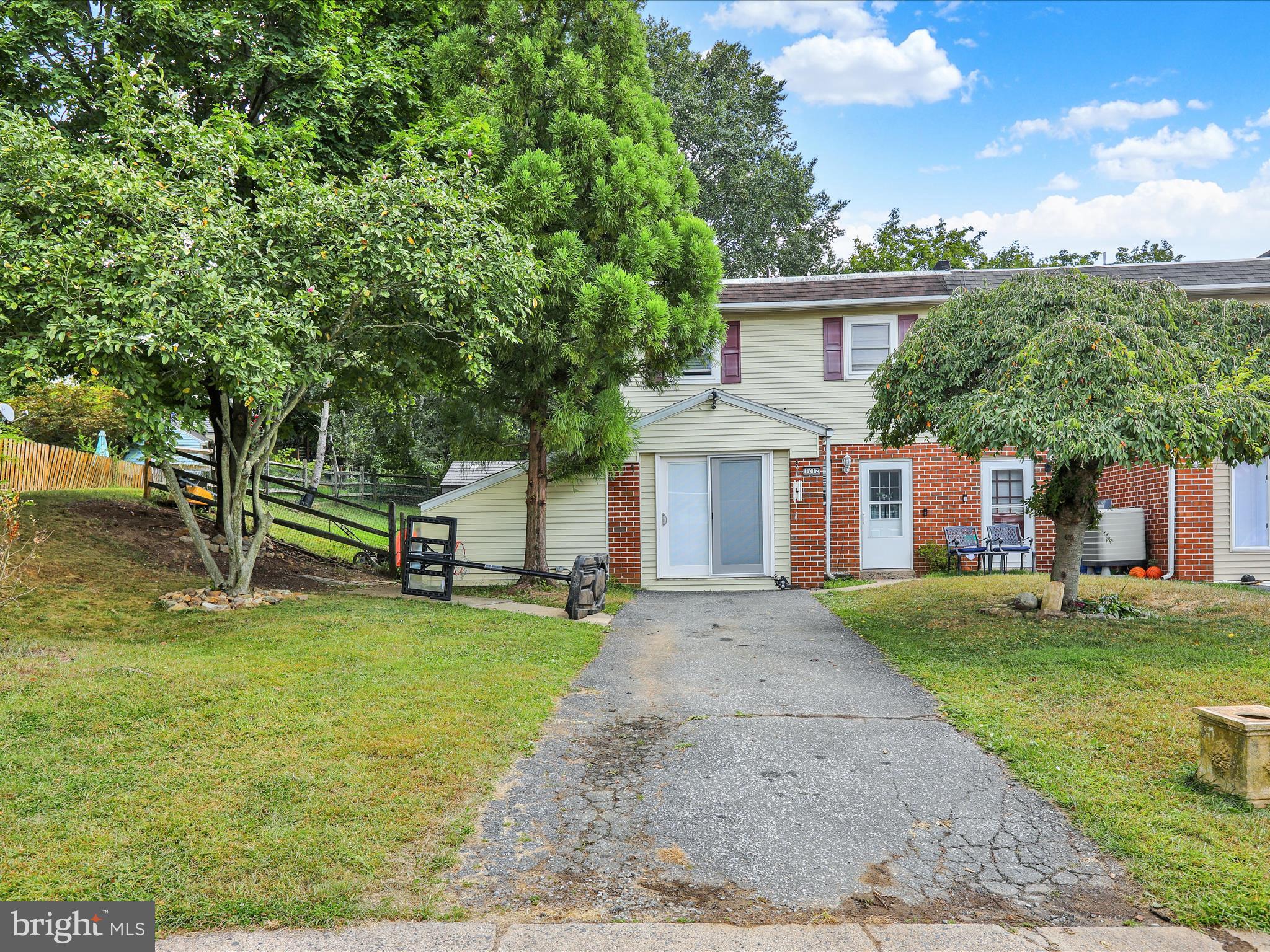 1212 Deer Run Reading, PA 19606 - Photo 29 of 29 a view of a house with a patio and a yard