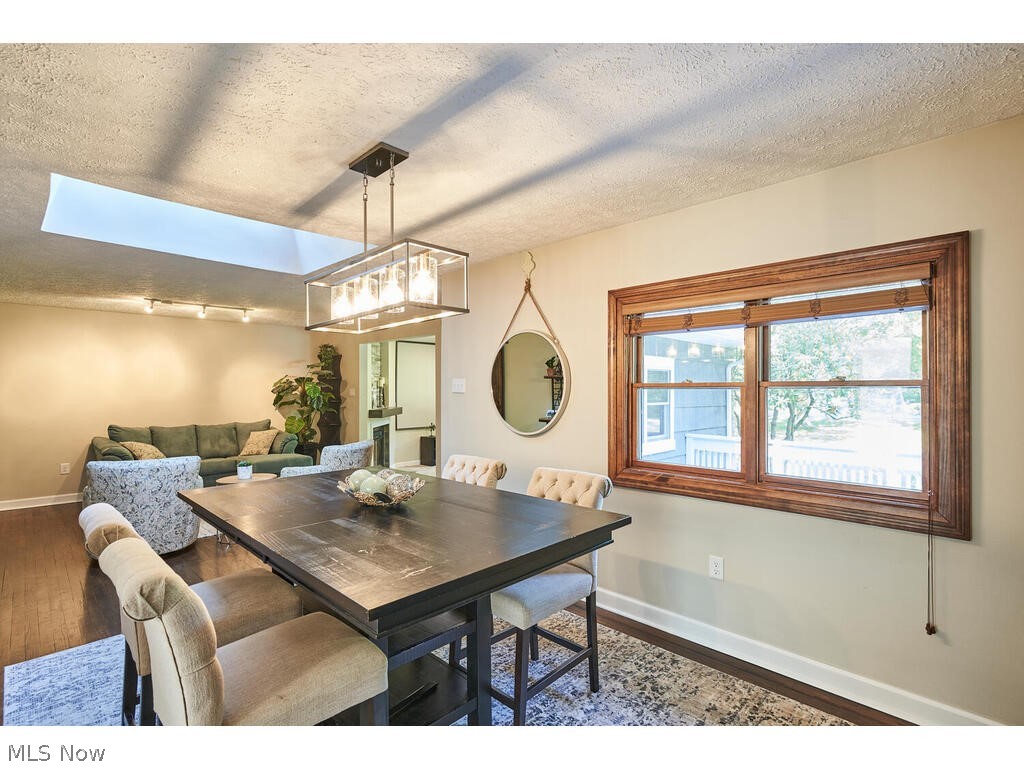 837 Brunsdorph Road Fairlawn, OH 44333 - Photo 7 of 35 Formal dining off the living room with newer skylight and hardwood floors.