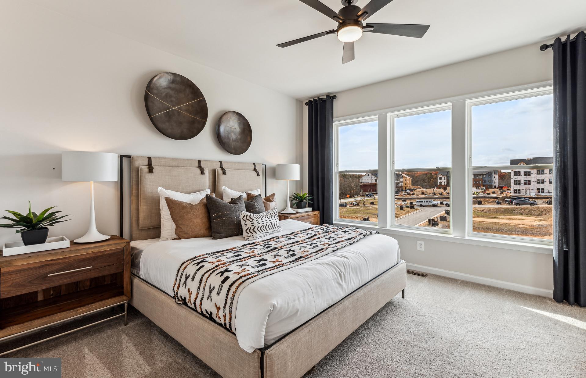 42841 Exeter Spg Terrace Leesburg, VA 20176 - Photo 6 of 38 a bedroom with bed and a large window