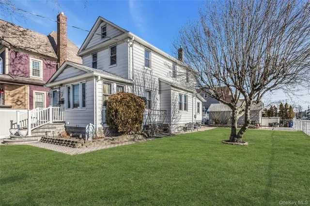 a view of a building with a yard