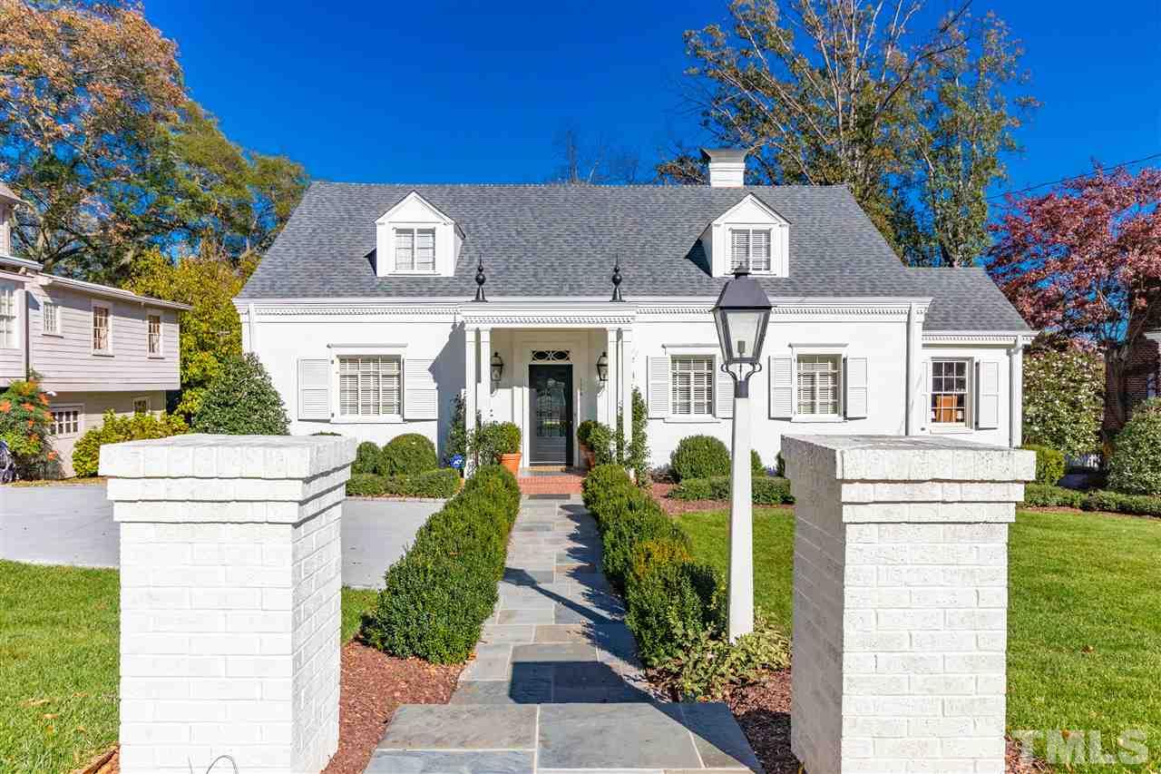 1114 Harvey Street Raleigh, NC 27608 - Photo 1 of 24 a front view of a house with garden